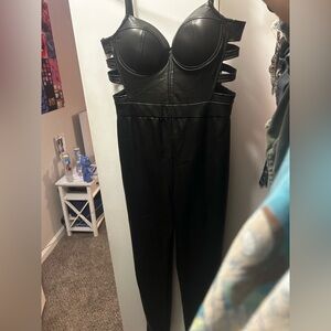 ALL BLACK LEATHER ONE PIECE WITH OPENED SIDE PARTS BRAND NEW NEVER WORN